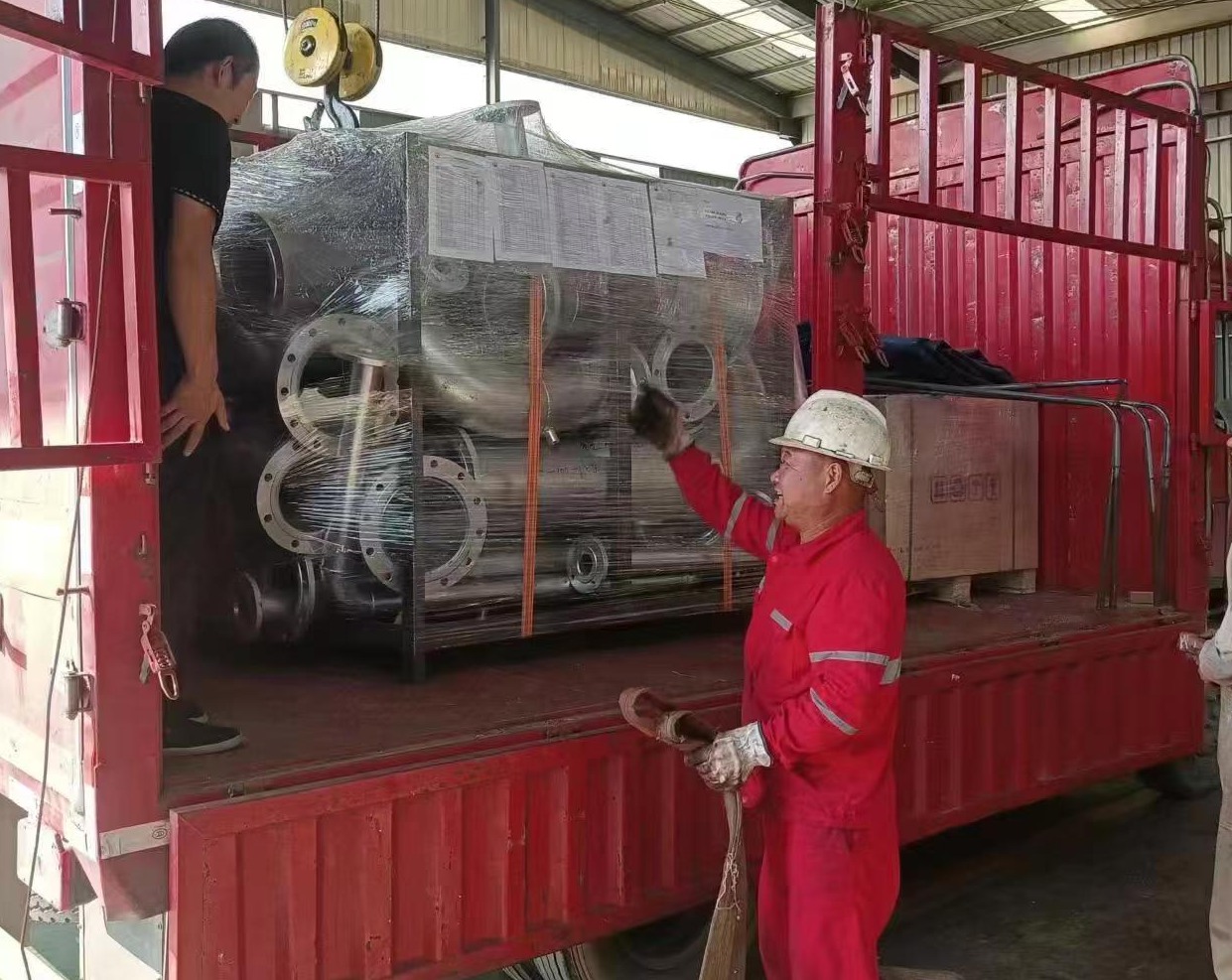 Pipe spools loaded for road delivery to shipyard