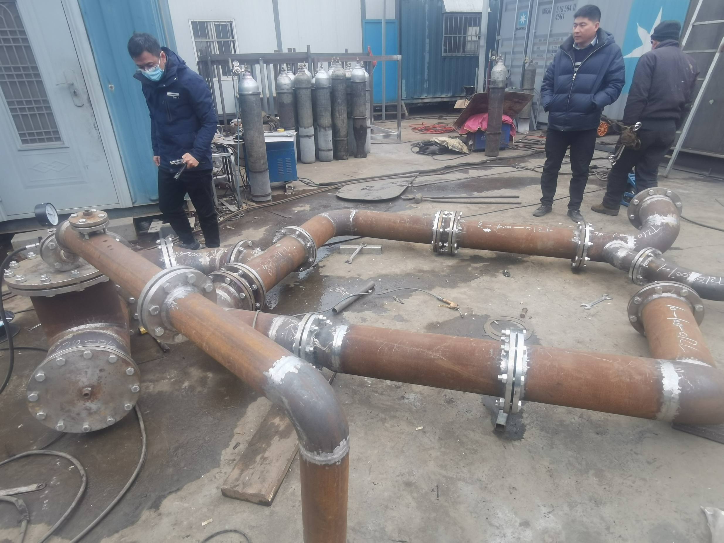 Multiple pipe spools laid out for inspection